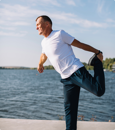 a man exercising on sea beach