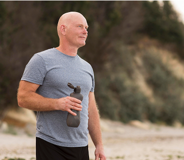 men holding water bottle