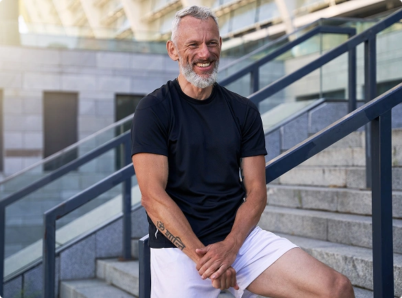 a man seating on stairs