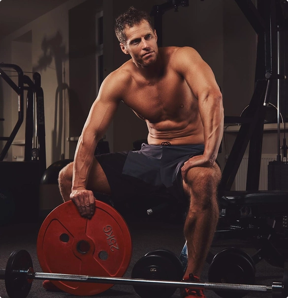 man-sitting-in-gym