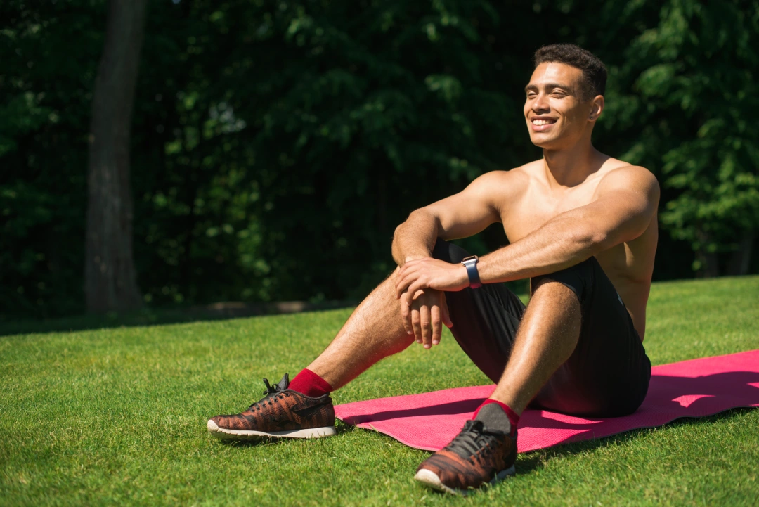 athletic-man-practicing-yoga-outdoor