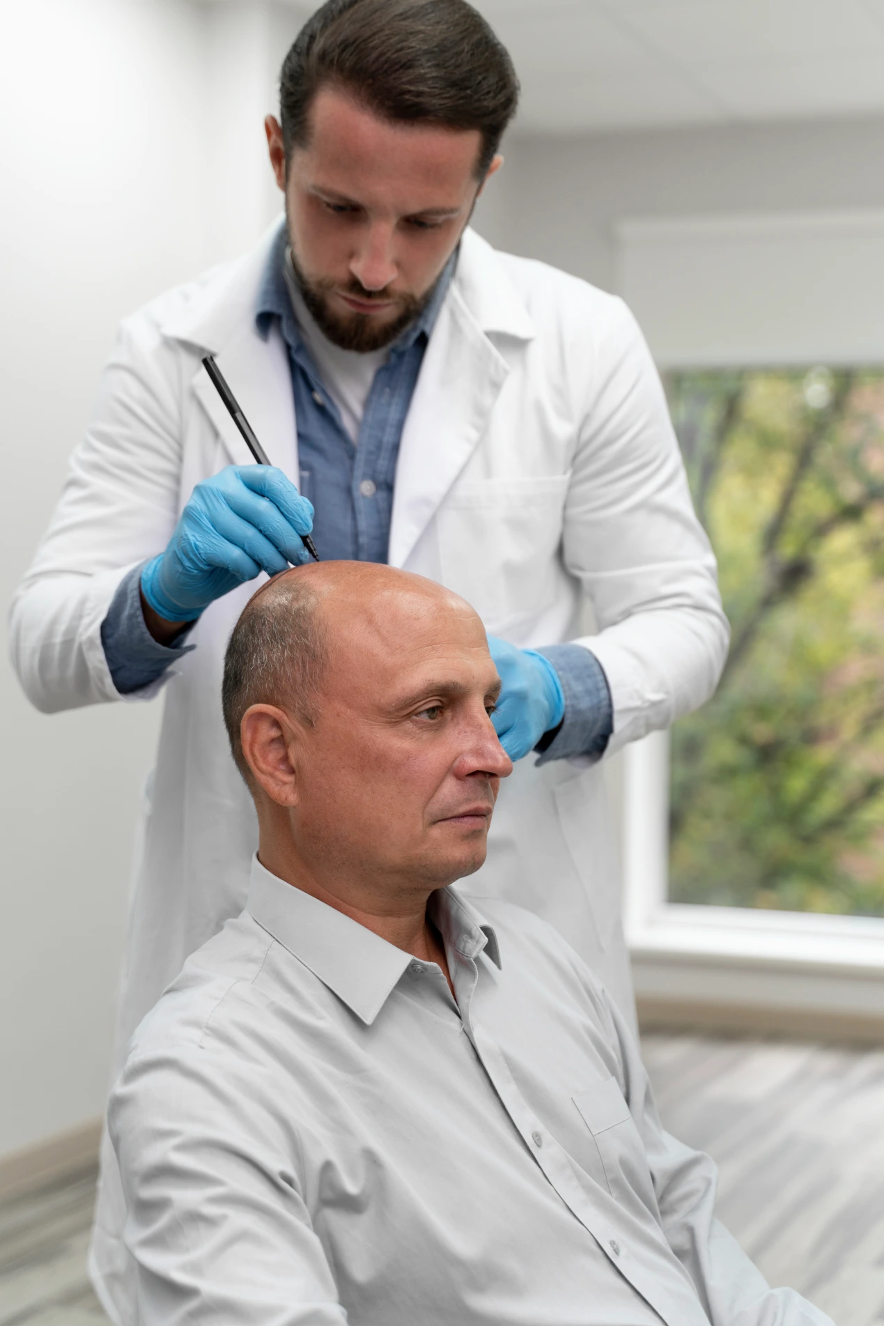 mature-man-going-through-follicular-unit-extraction-process mature-man-going-through-follicular-unit-extraction-process
