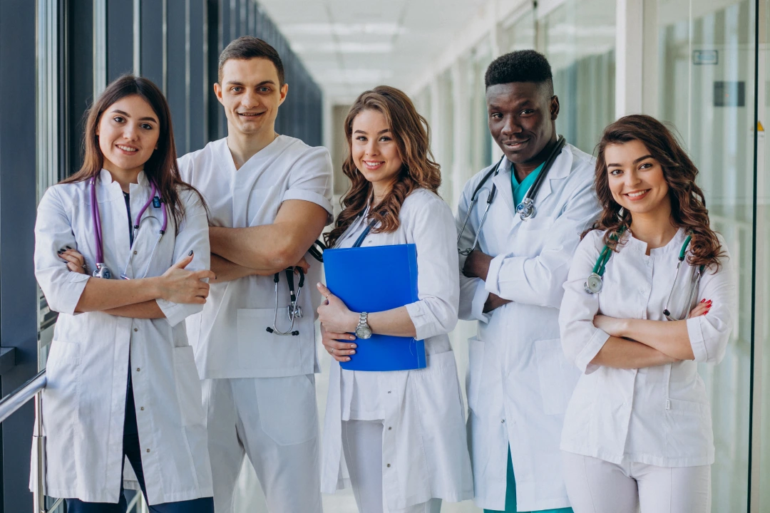 team-young-specialist-doctors-standing-corridor-hospital 