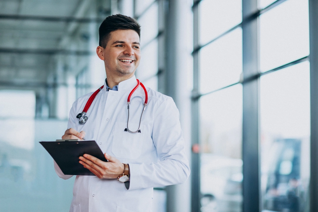 young-handsome-physician-medical-robe-with-stethoscope (1)